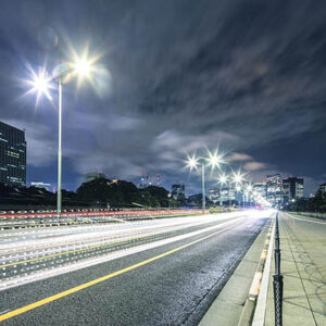 smart traffic on road in tokyo at night